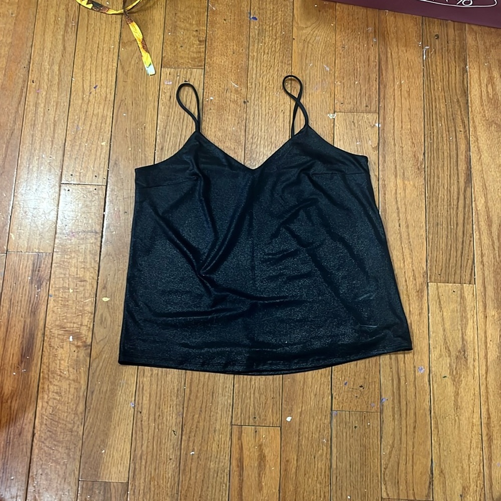 Loose fitting black sparkly blouse